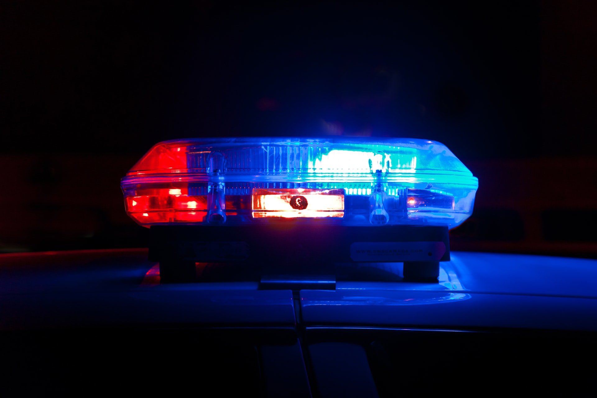 Close-up of flashing police car lights